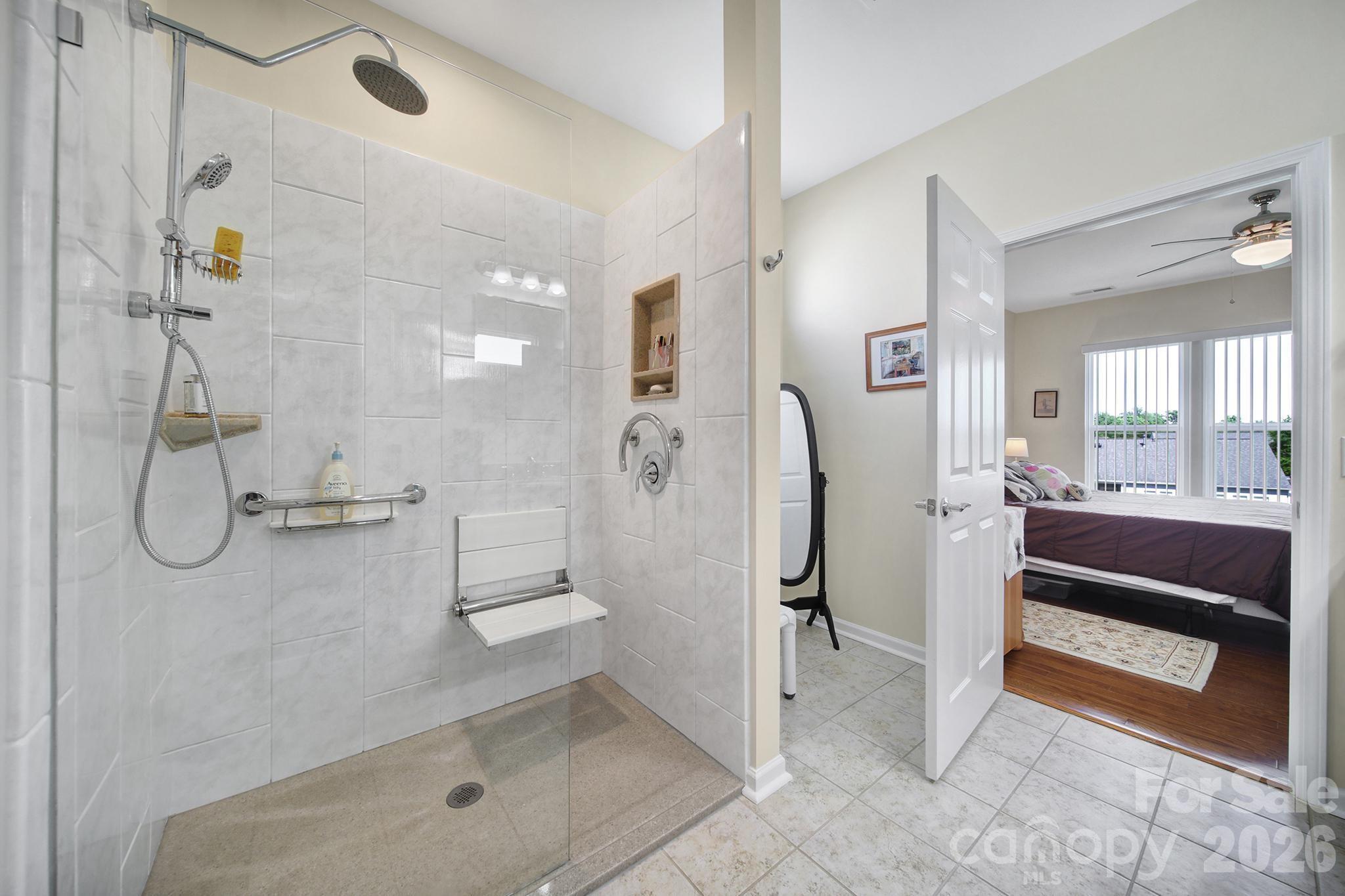 8080 Pawleys Court Fort Mill, SC 29707 - Photo 19 of 44 a bathroom with a shower and a sink