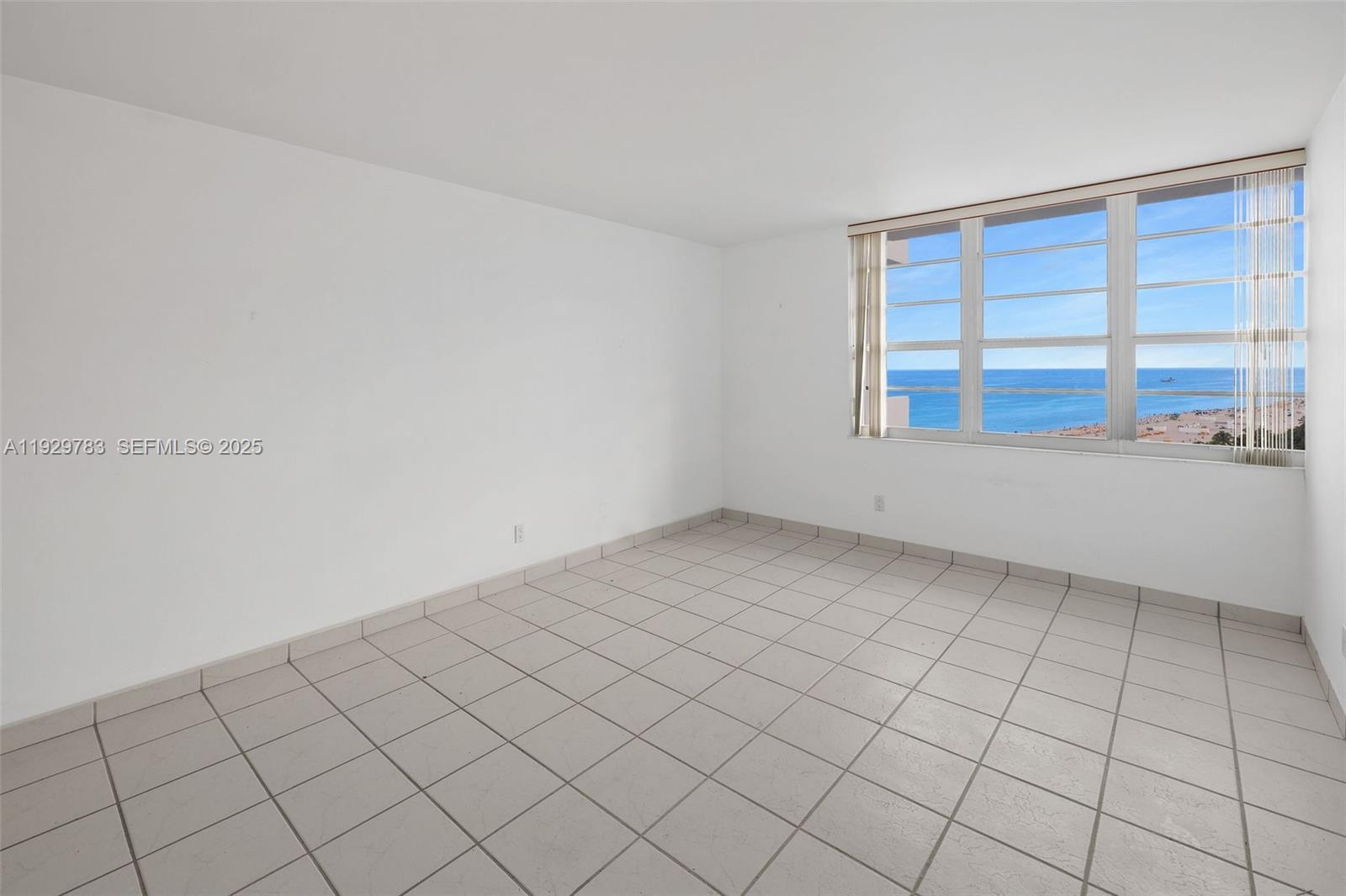 100 Lincoln Road, Unit 1444 Miami Beach, FL 33139 - Photo 18 of 38 a view of an empty room with a window
