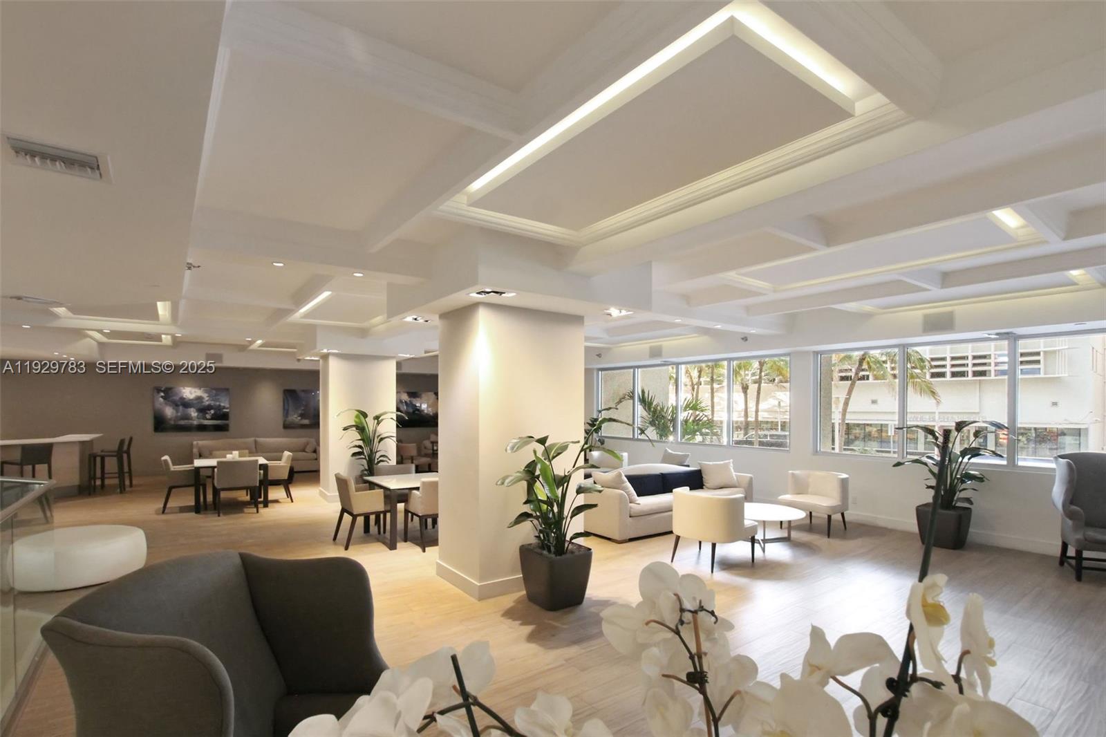 100 Lincoln Road, Unit 1444 Miami Beach, FL 33139 - Photo 26 of 38 a living room with furniture and a large window