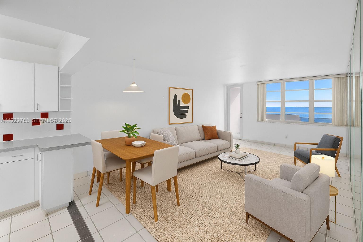 100 Lincoln Road, Unit 1444 Miami Beach, FL 33139 - Photo 4 of 38 a living room with furniture a window and a table