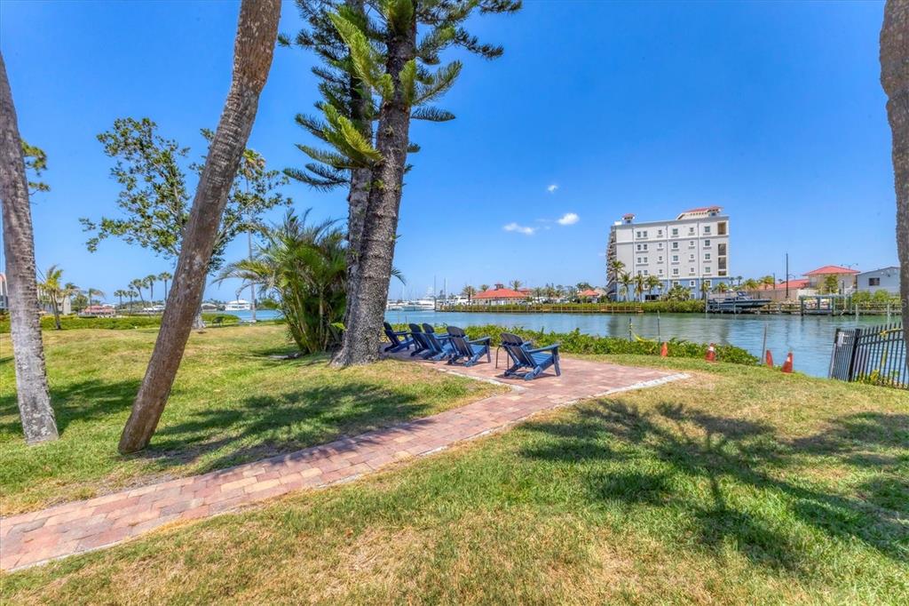 210 Santa Maria Street, Unit 248 Venice, FL 34285 - Photo 34 of 72 a view of a house with a yard and lake view