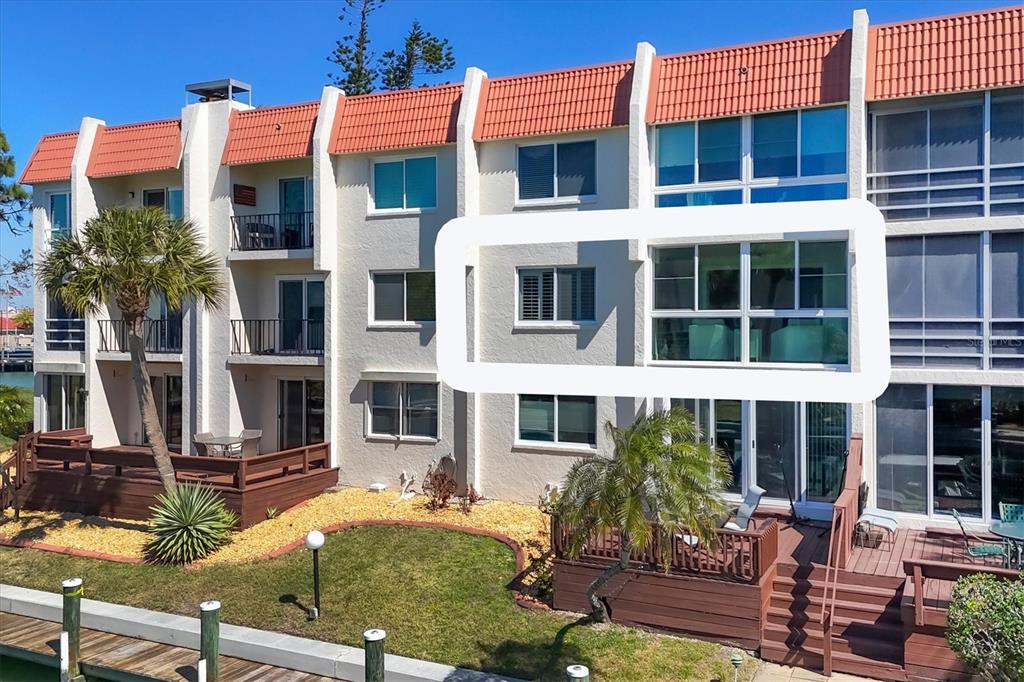 210 Santa Maria Street, Unit 248 Venice, FL 34285 - Photo 40 of 72 front view of a building with a lots of windows