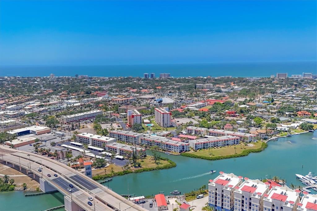 210 Santa Maria Street, Unit 248 Venice, FL 34285 - Photo 46 of 72 an aerial view of ocean and residential houses with outdoor space