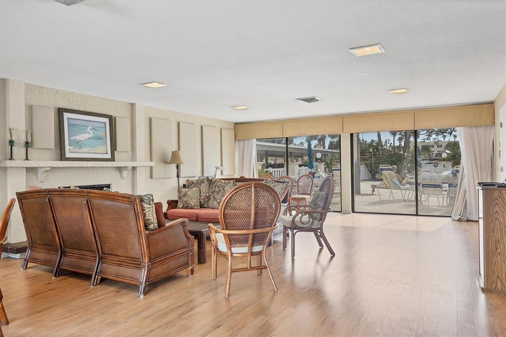 210 Santa Maria Street, Unit 248 Venice, FL 34285 - Photo 54 of 72 a living room with furniture and a large window