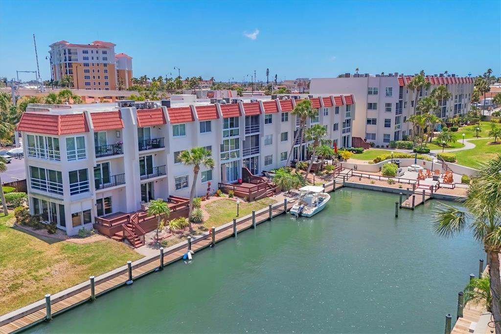 210 Santa Maria Street, Unit 248 Venice, FL 34285 - Photo 70 of 72 a view of swimming pool with outdoor seating space and a ocean view in back