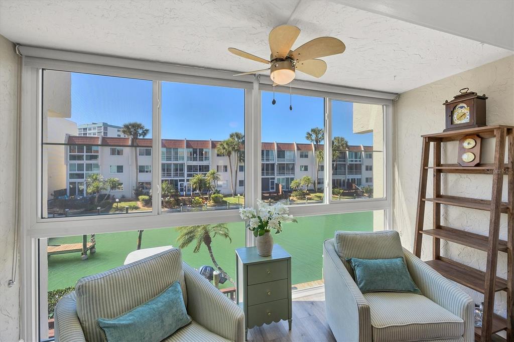 210 Santa Maria Street, Unit 248 Venice, FL 34285 - Photo 8 of 72 a living room with furniture and a large window