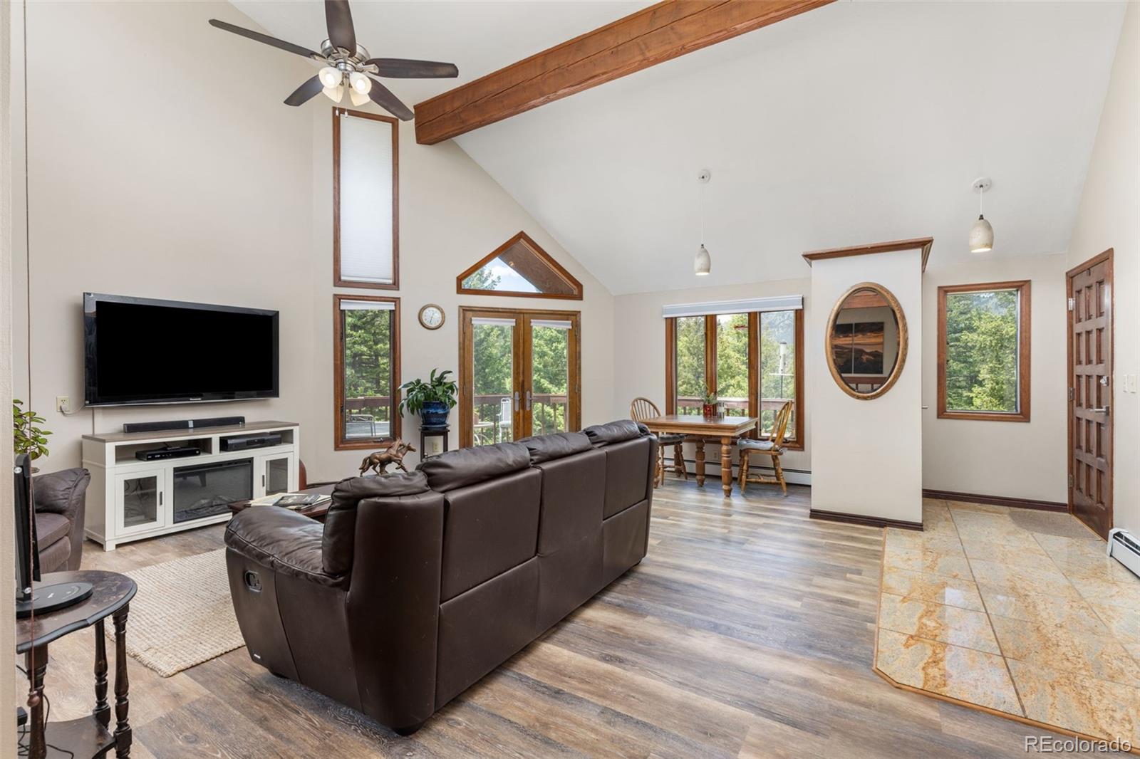 173 Silver Cloud Lane Boulder, CO 80302 - Photo 10 of 43 a living room with furniture and a flat screen tv