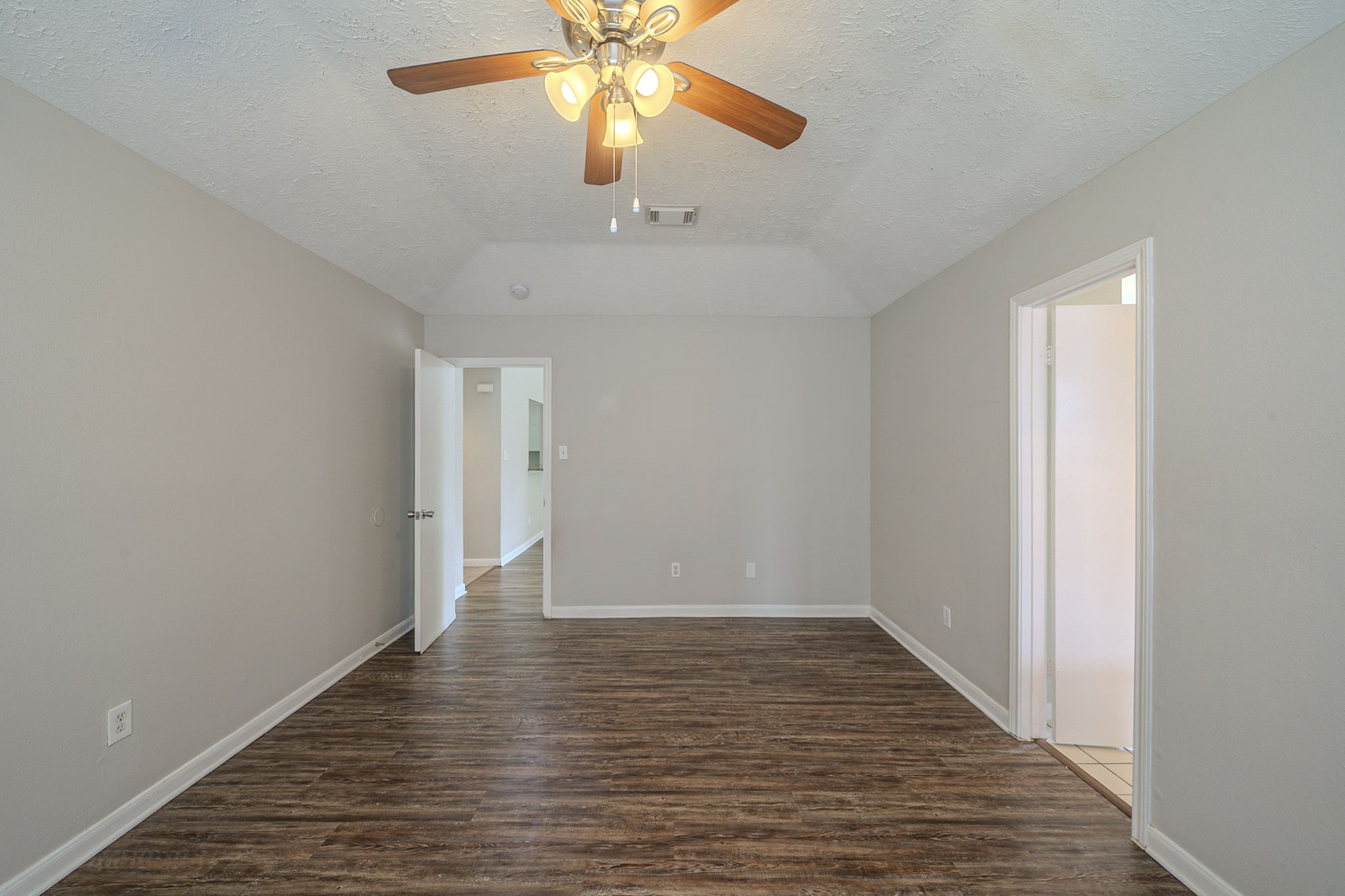 4127 Adonis Drive Spring, TX 77373 - Photo 10 of 20 a view of an empty room with wooden floor