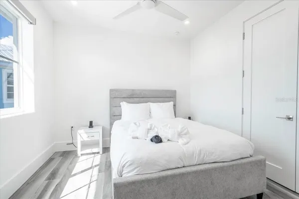 a bathroom with a toilet a sink and a mirror