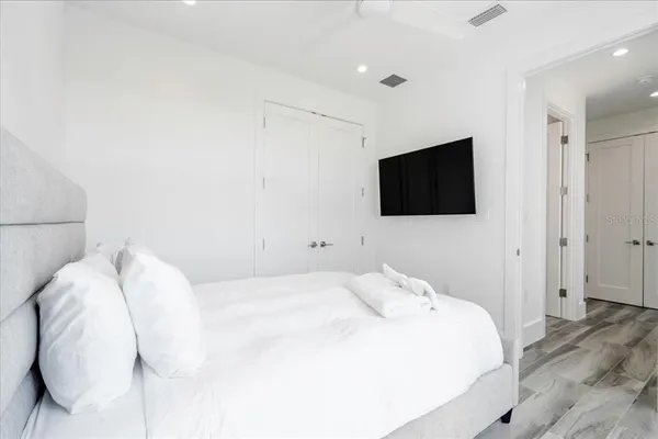 a view of a backyard with sitting area