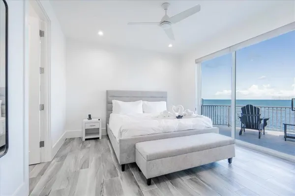 a living room with furniture and a garden