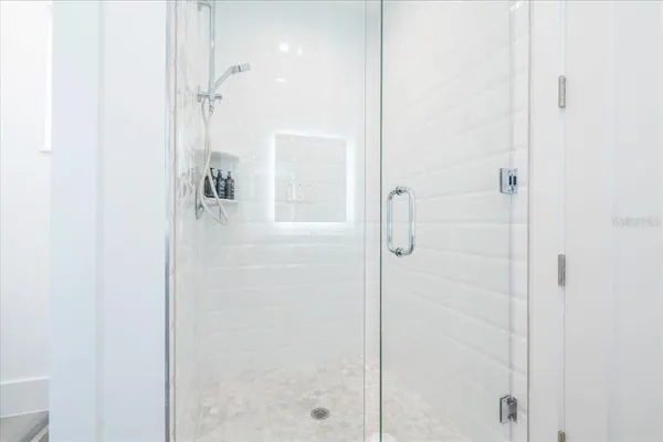 a storage room with washer and dryer