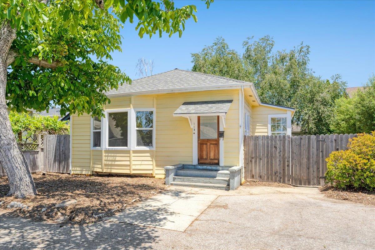 113 Fairbanks Street Santa Cruz, CA 95060 - Photo 1 of 27 a front view of a house with a yard and garage