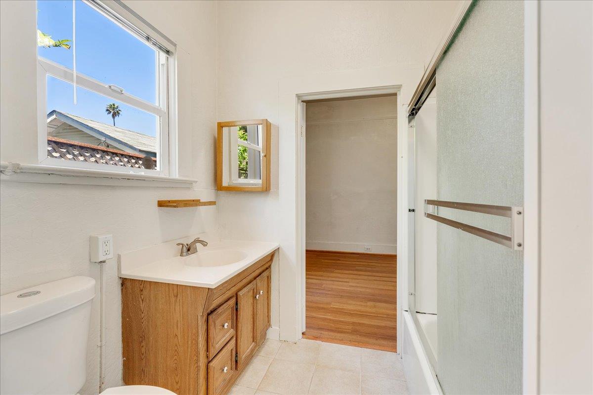 113 Fairbanks Street Santa Cruz, CA 95060 - Photo 16 of 27 a bathroom with a sink and a shower