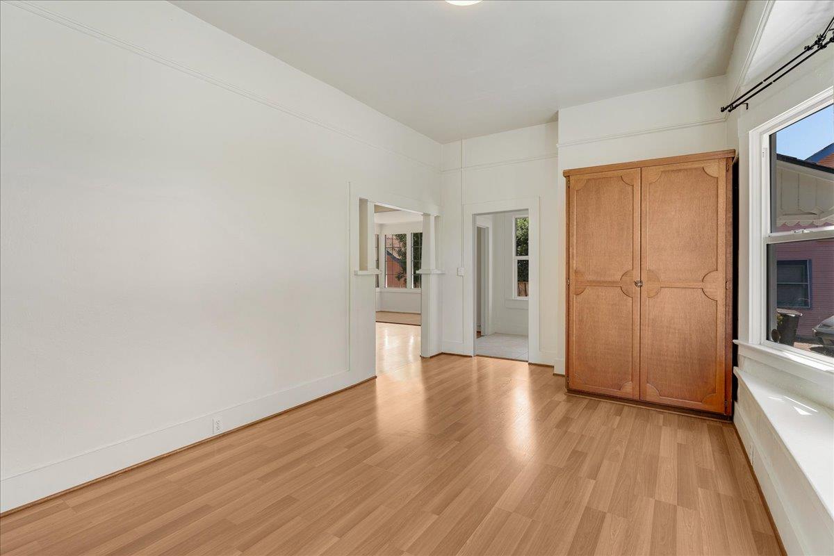 113 Fairbanks Street Santa Cruz, CA 95060 - Photo 6 of 27 a view of a hardwood floor in an empty room