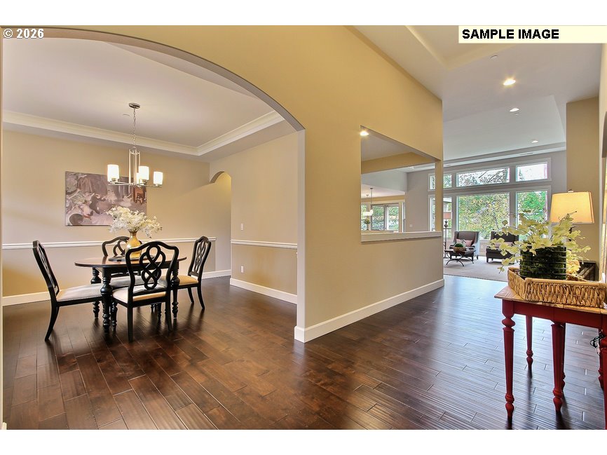 16997 Southwest Parrett Mountain Road Sherwood, OR 97140 - Photo 6 of 15 a dining room with furniture and wooden floor