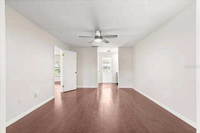 a bathroom with a granite countertop sink mirror and a