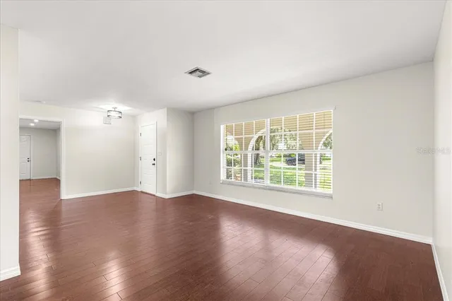 a view of a house with backyard