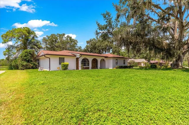 a view of an ocean and a yard