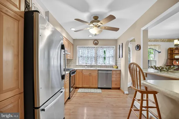 a view of living room with granite countertop furniture and a window