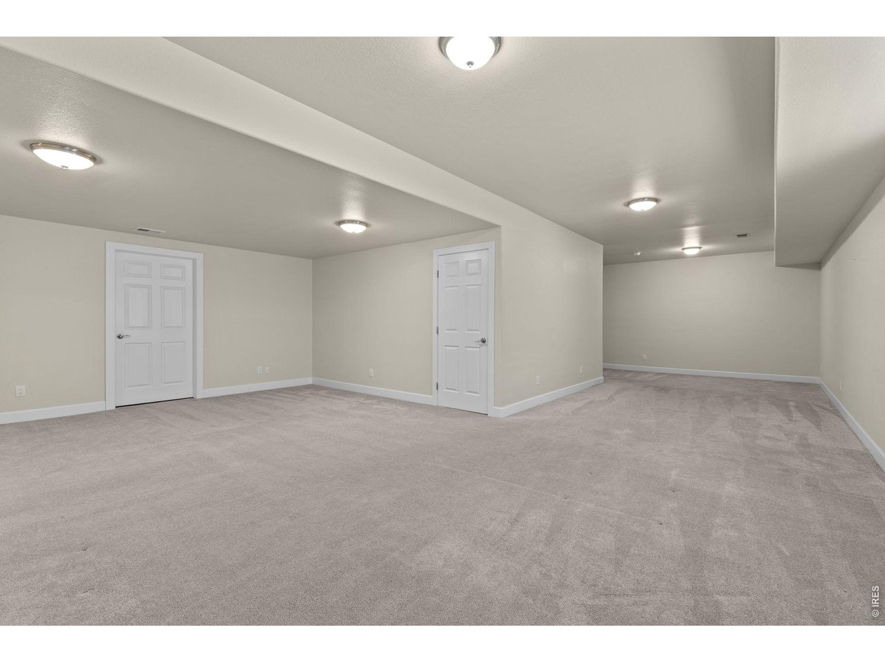 2002 Trail Ridge Drive Severance, CO 80615 - Photo 30 of 50 Another standout feature of the home is the fully finished basement featuring a large rec room that gives you flexibility for entertaining or relaxing.