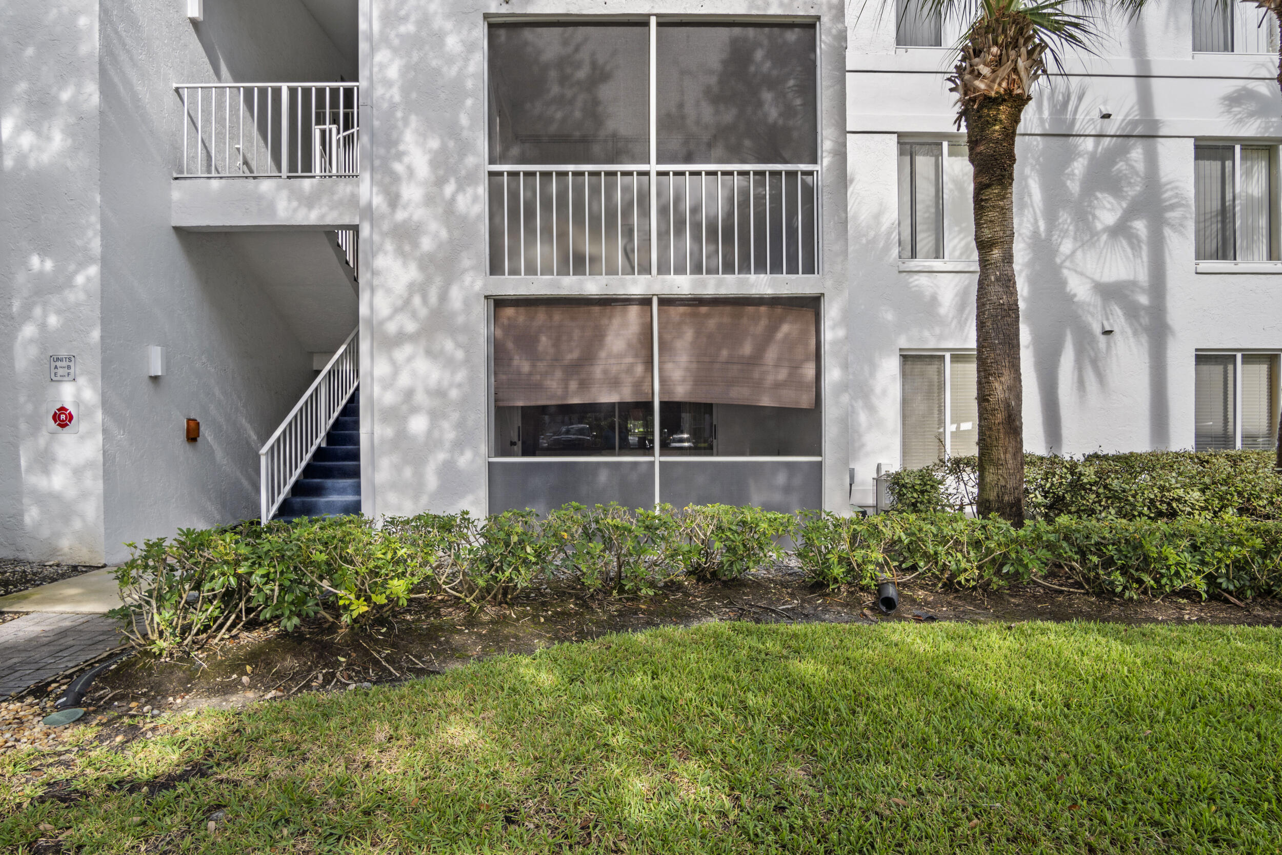 2512 Southeast Anchorage Cove, Unit B1 Port St. Lucie, FL 34952 - Photo 8 of 35 a view of a garden with a staircase