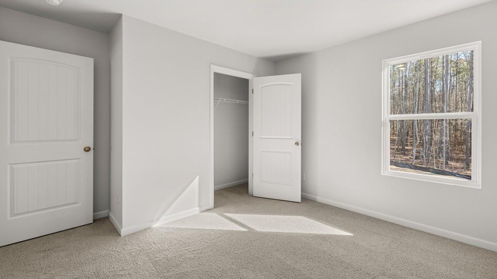 247 Hampton Terrace Dallas, GA 30157 - Photo 21 of 29 an empty room with windows