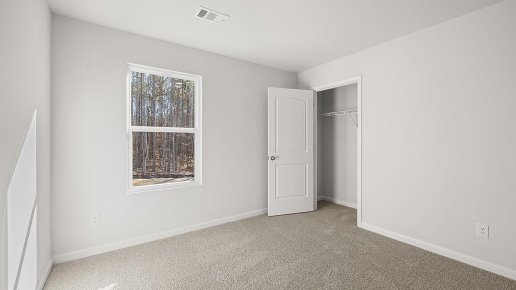 247 Hampton Terrace Dallas, GA 30157 - Photo 22 of 29 a view of an empty room with window and closet area