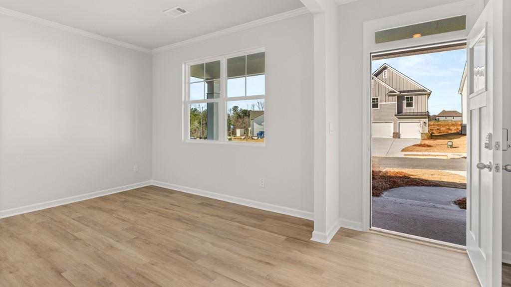 247 Hampton Terrace Dallas, GA 30157 - Photo 3 of 29 an empty room with windows