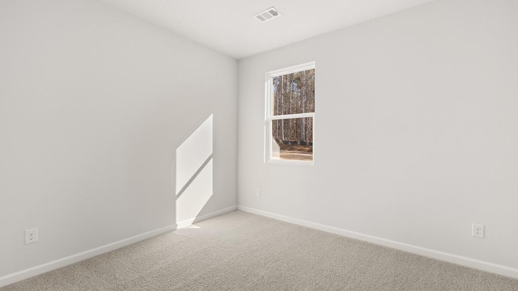 247 Hampton Terrace Dallas, GA 30157 - Photo 9 of 29 a view of an empty room with a window