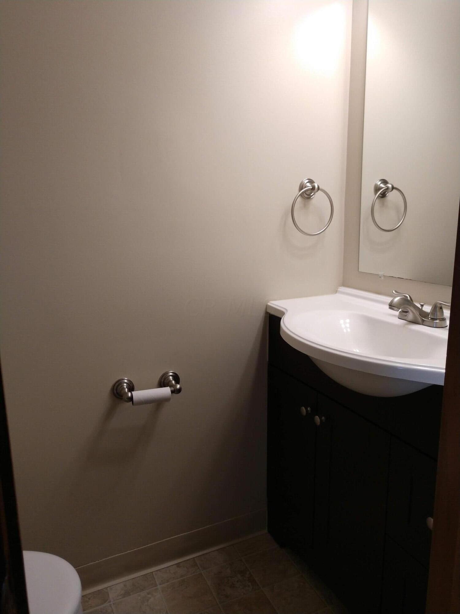 208 West Weber Road Columbus, OH 43202 - Photo 6 of 8 Renovated half bathroom on first floor.