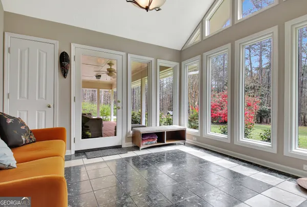 a kitchen with granite countertop cabinets stainless steel appliances and a sink