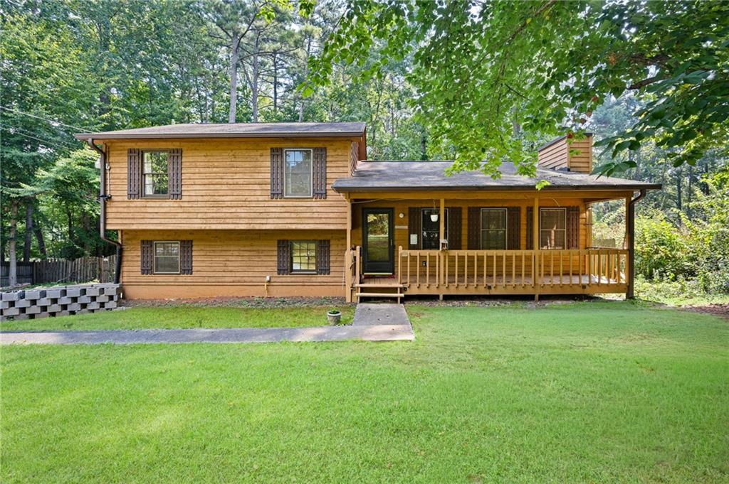 170 Beatrice Street Dallas, GA 30157 - Photo 1 of 1 a view of a house with a yard and a deck