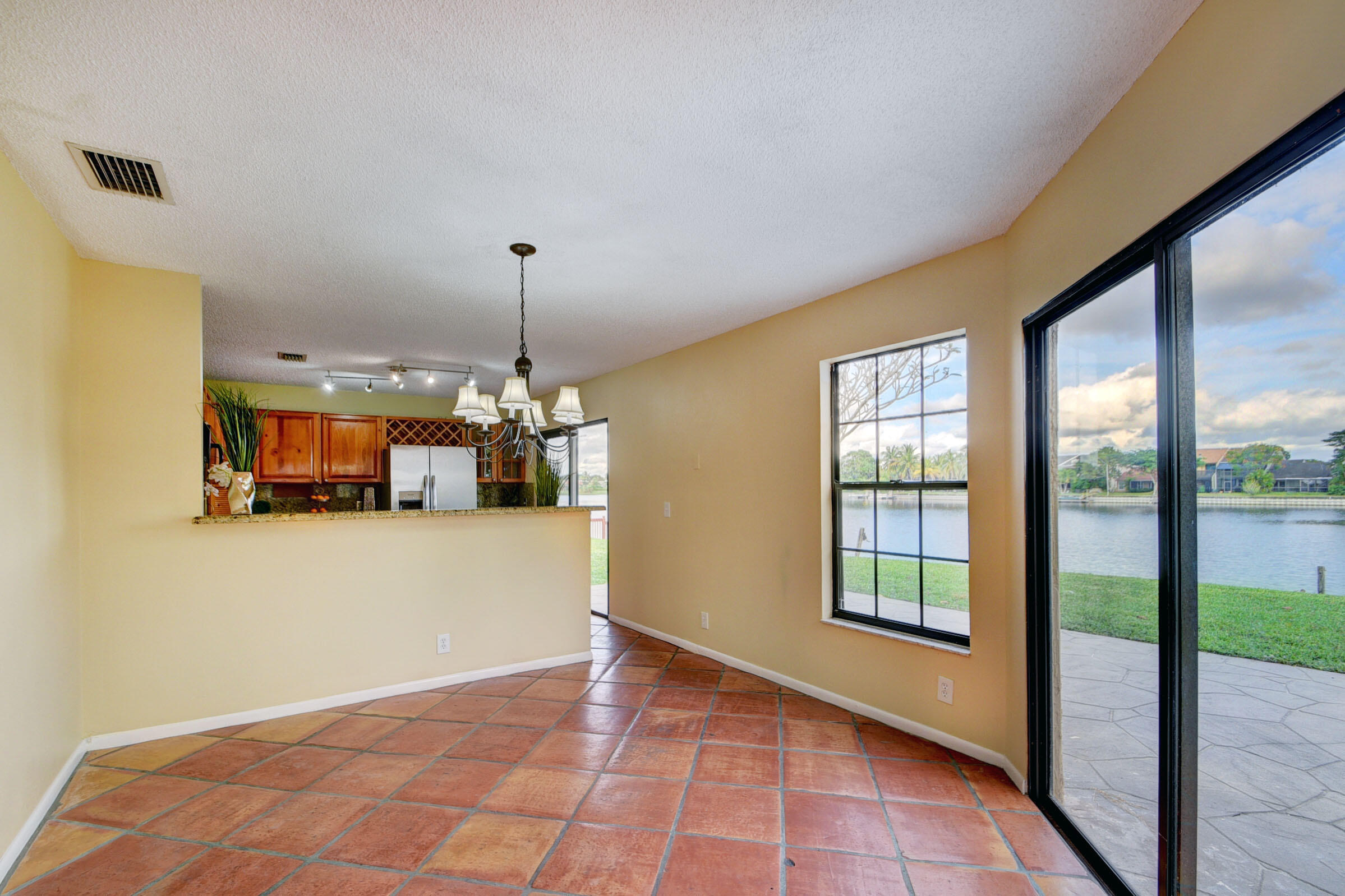 12561 Shoreside Lane Wellington, FL 33414 - Photo 11 of 31 a view of a room with a large window