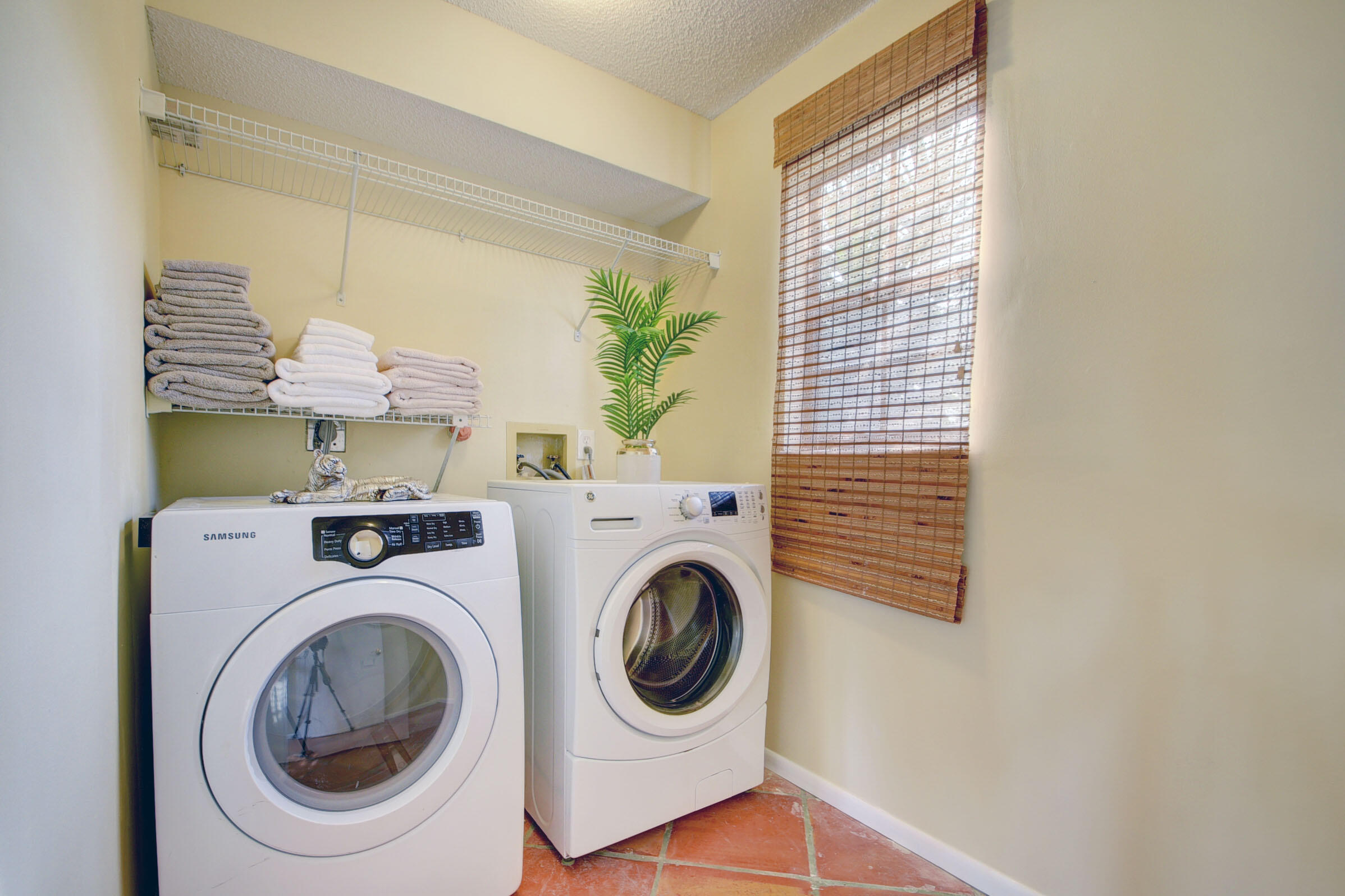 12561 Shoreside Lane Wellington, FL 33414 - Photo 14 of 31 a utility room with dryer and washer