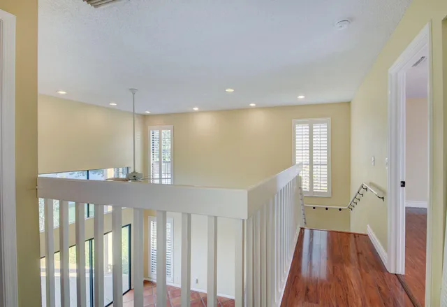 a view of entryway with wooden floor