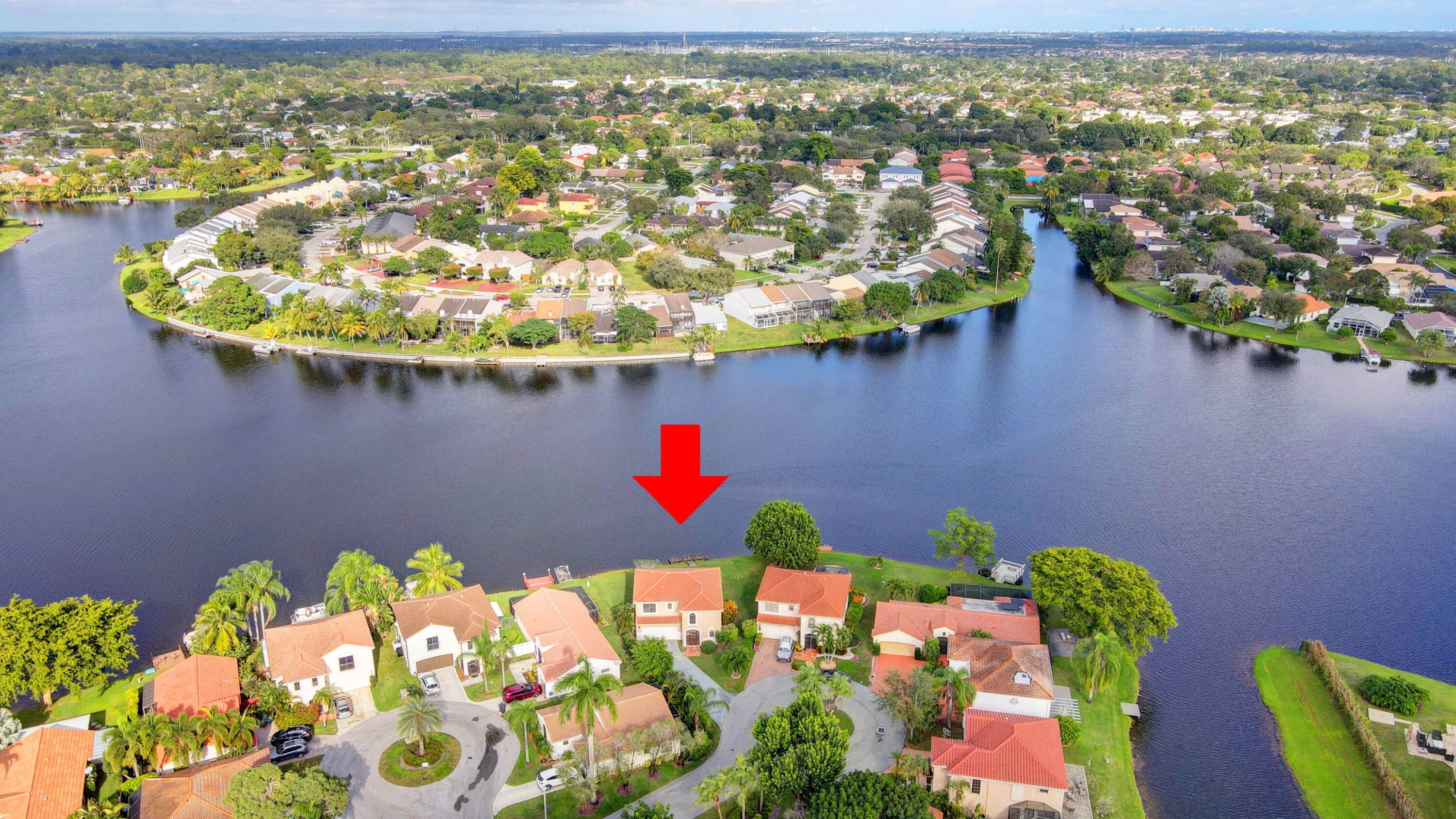 12561 Shoreside Lane Wellington, FL 33414 - Photo 27 of 31 a vase of flowers sitting on a table