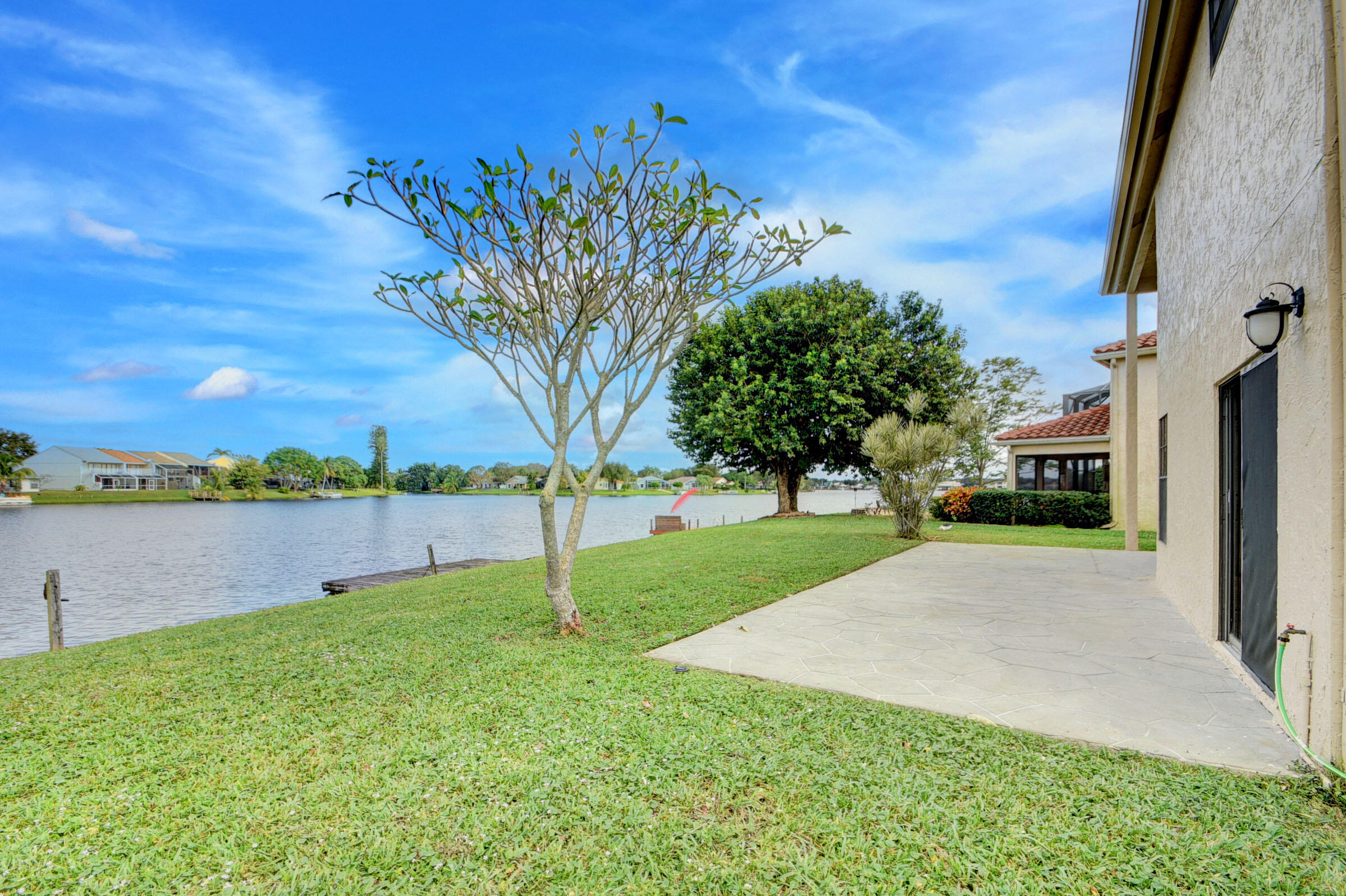 12561 Shoreside Lane Wellington, FL 33414 - Photo 28 of 31 a view of a garden with a tree