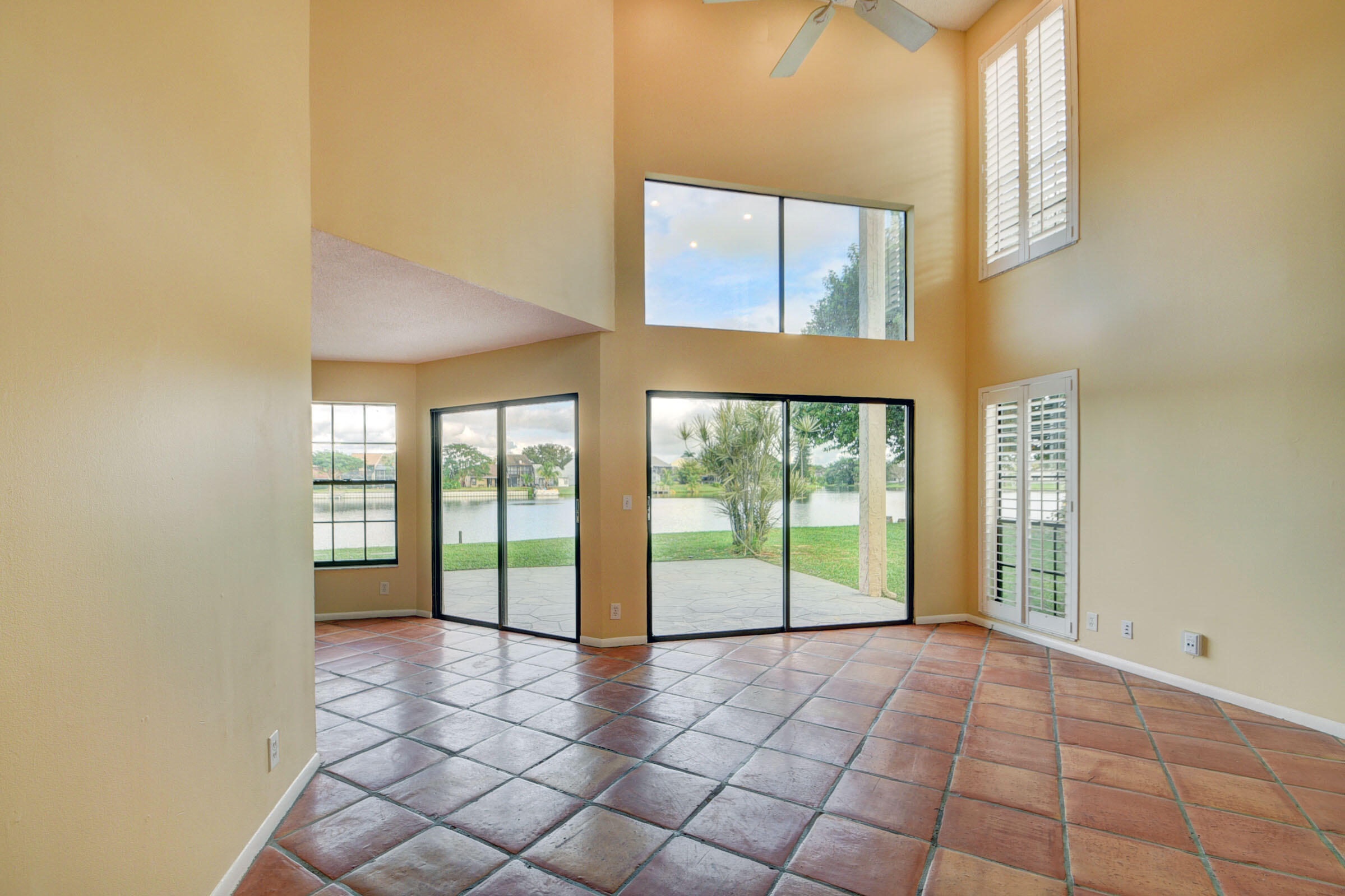 12561 Shoreside Lane Wellington, FL 33414 - Photo 9 of 31 a view of an empty room with a window