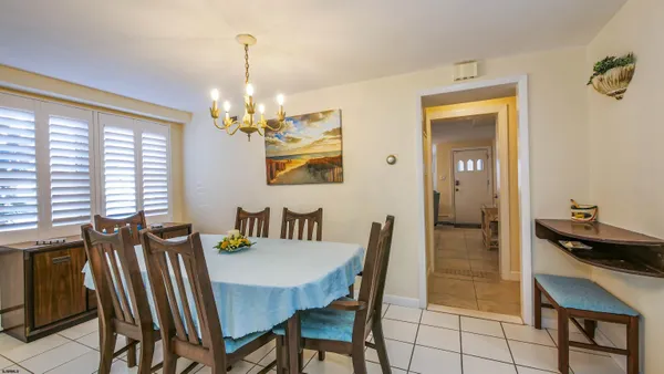 a kitchen with stainless steel appliances a refrigerator and a stove top oven