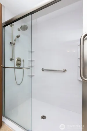 a view of an empty room and closet area