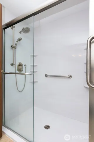 a view of an empty room and closet area