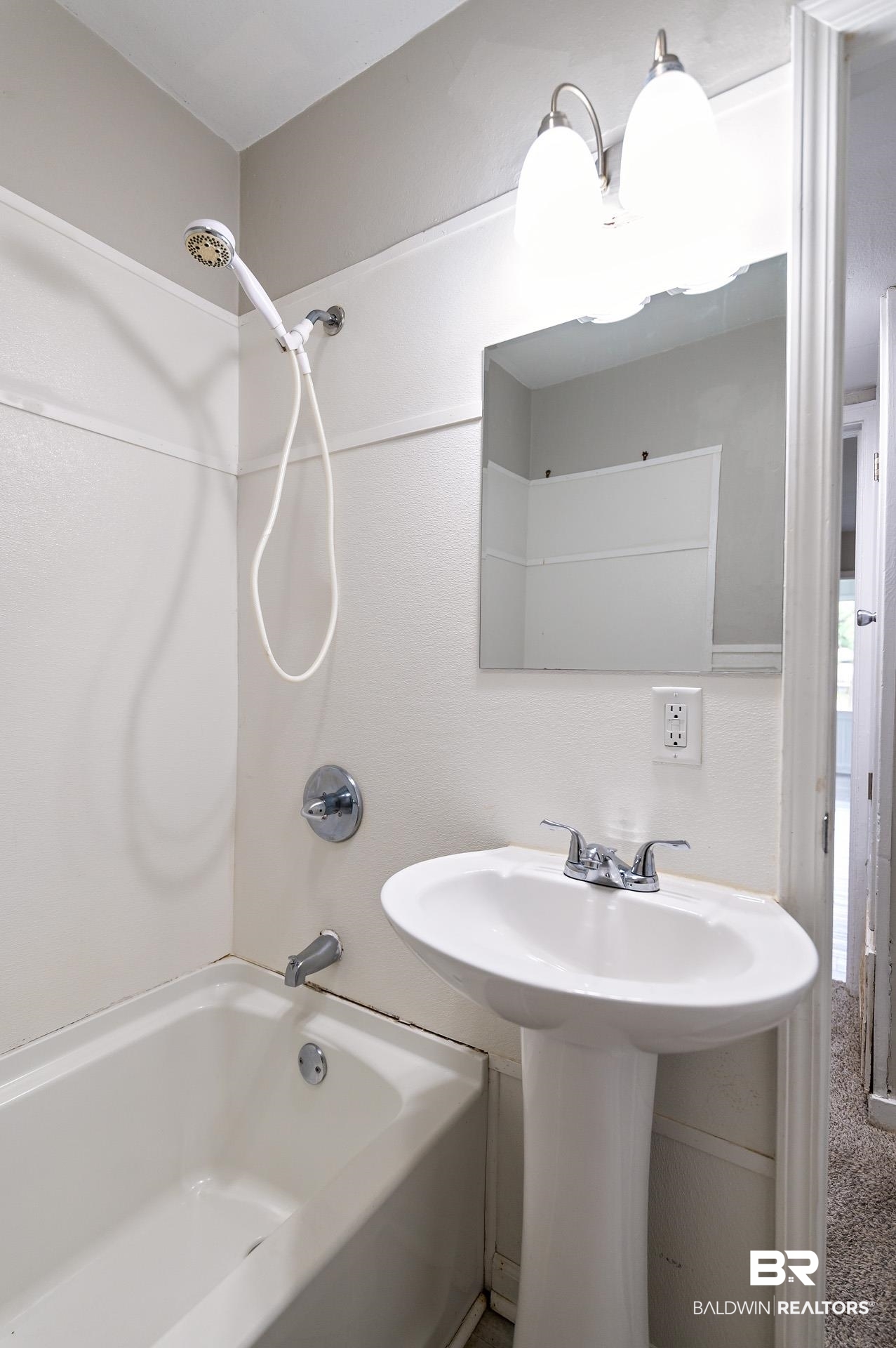 1869 Mott Drive West Mobile, AL 36617 - Photo 22 of 34 Bathroom featuring shower / washtub combination