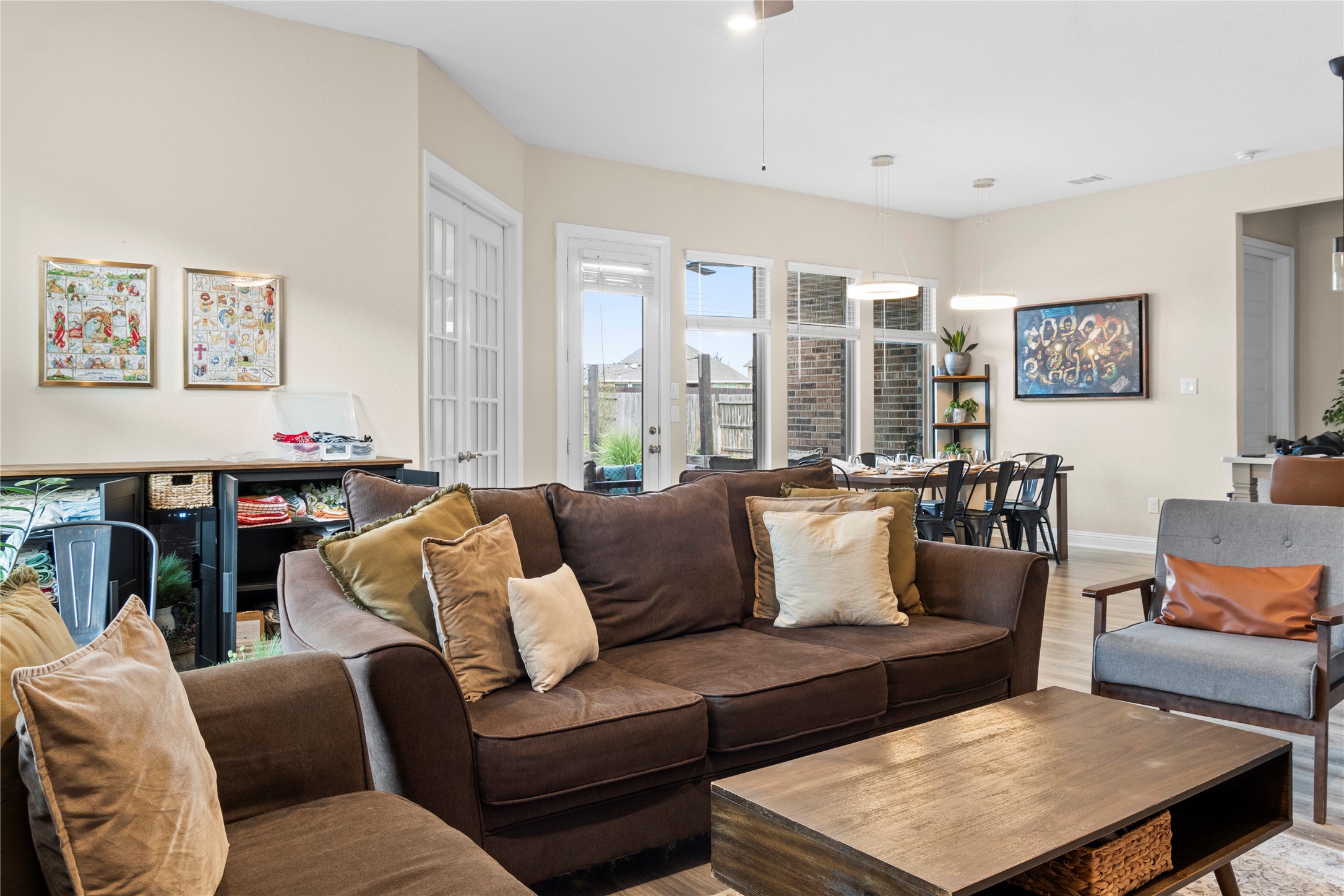 7518 Windsong Bend Road Spring, TX 77379 - Photo 12 of 49 a living room with furniture and a large window