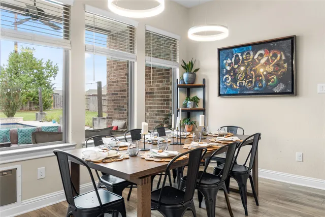 a dining hall with furniture and window