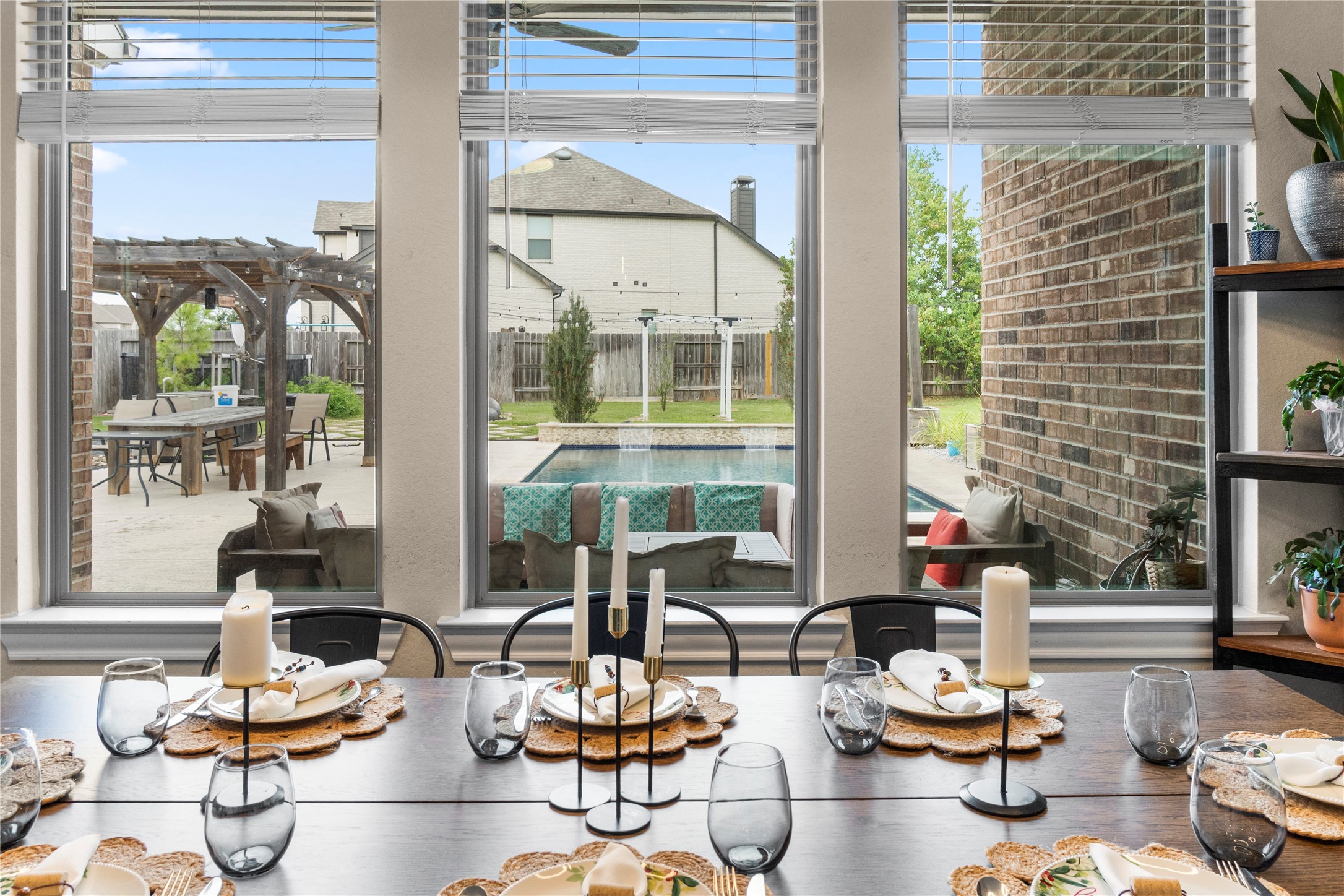 7518 Windsong Bend Road Spring, TX 77379 - Photo 17 of 49 a view of a dining room with furniture water view and front of floor