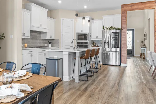 a hallway with cabinets