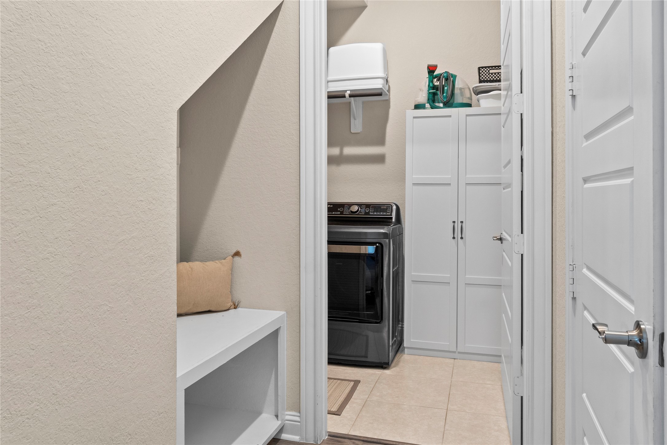 7518 Windsong Bend Road Spring, TX 77379 - Photo 20 of 49 a hallway with cabinets
