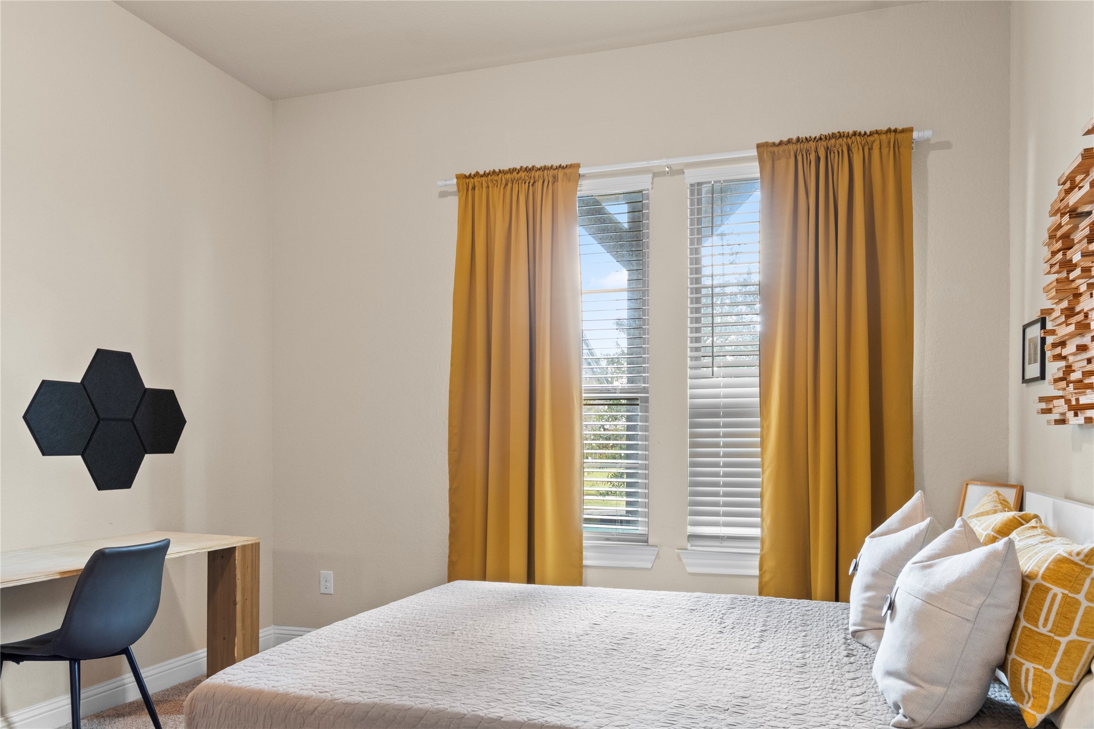 7518 Windsong Bend Road Spring, TX 77379 - Photo 33 of 49 a bedroom with a bed and wooden floor