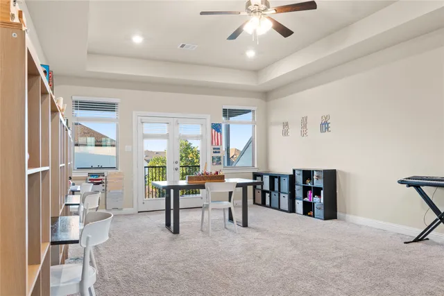 a room with furniture and a book shelf